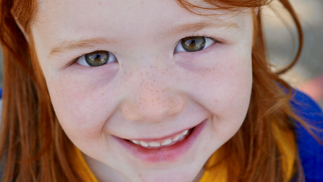 A close up face of a young girl