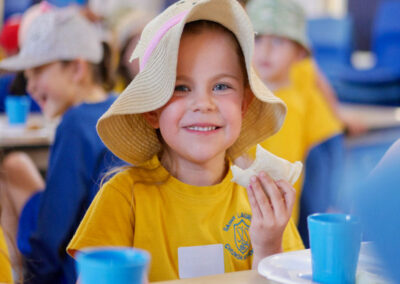 School girl enjoying a sandwich